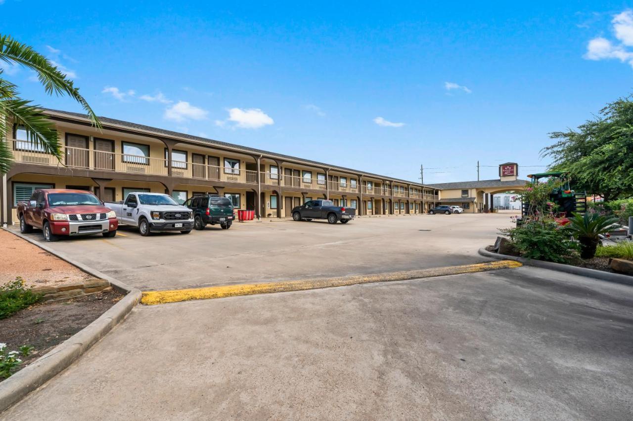 Executive Inn & Suites Magnolia Buitenkant foto