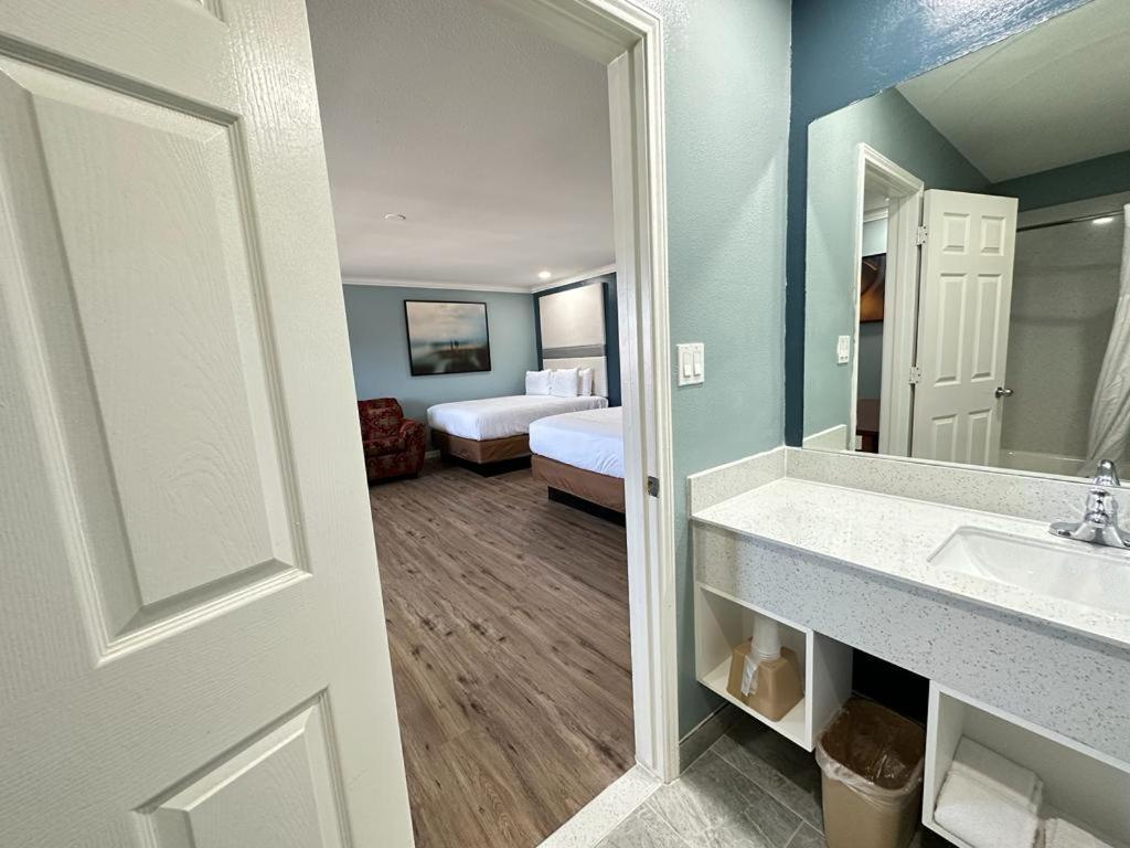 Executive Inn & Suites Magnolia Buitenkant foto