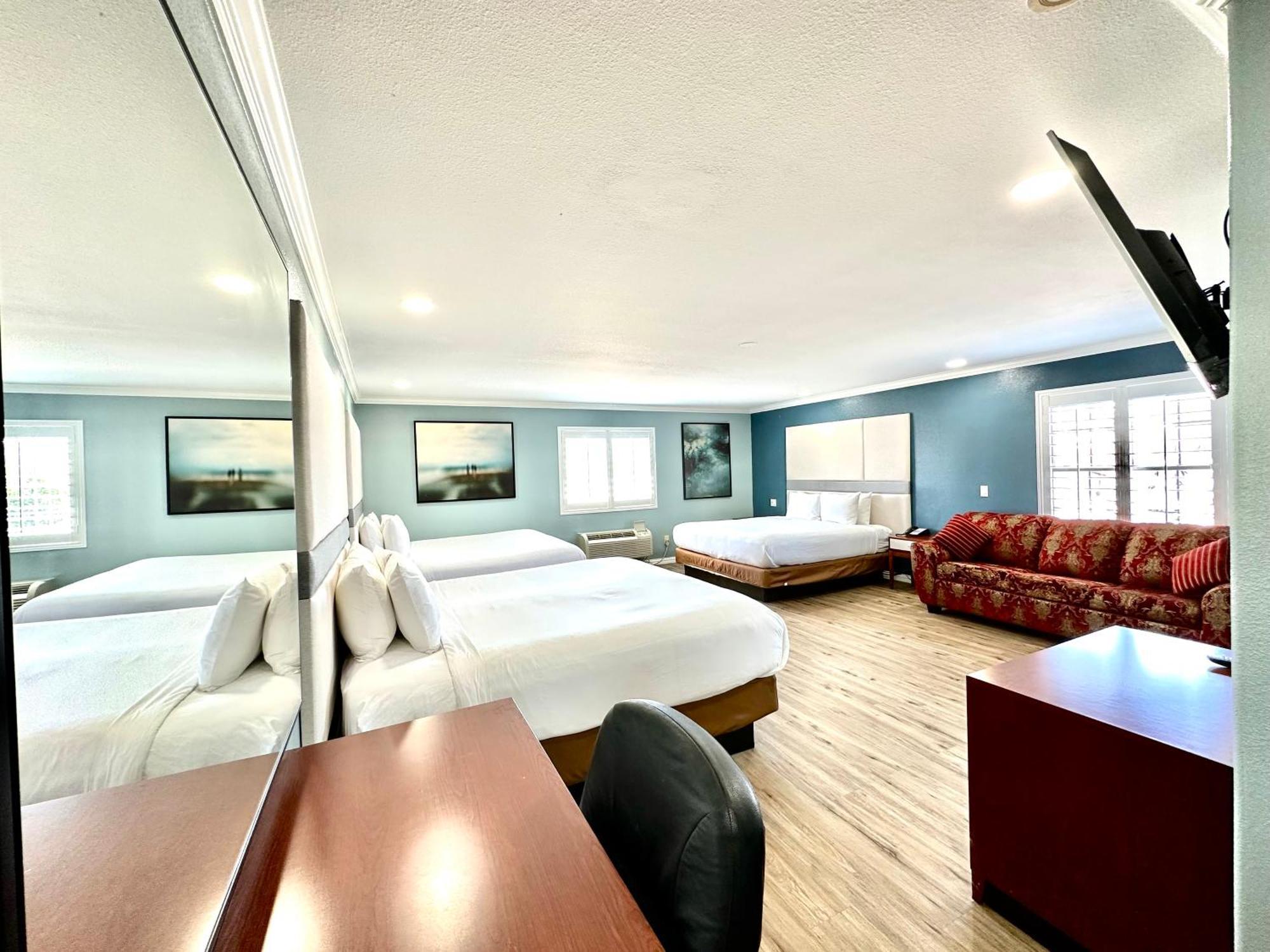 Executive Inn & Suites Magnolia Buitenkant foto