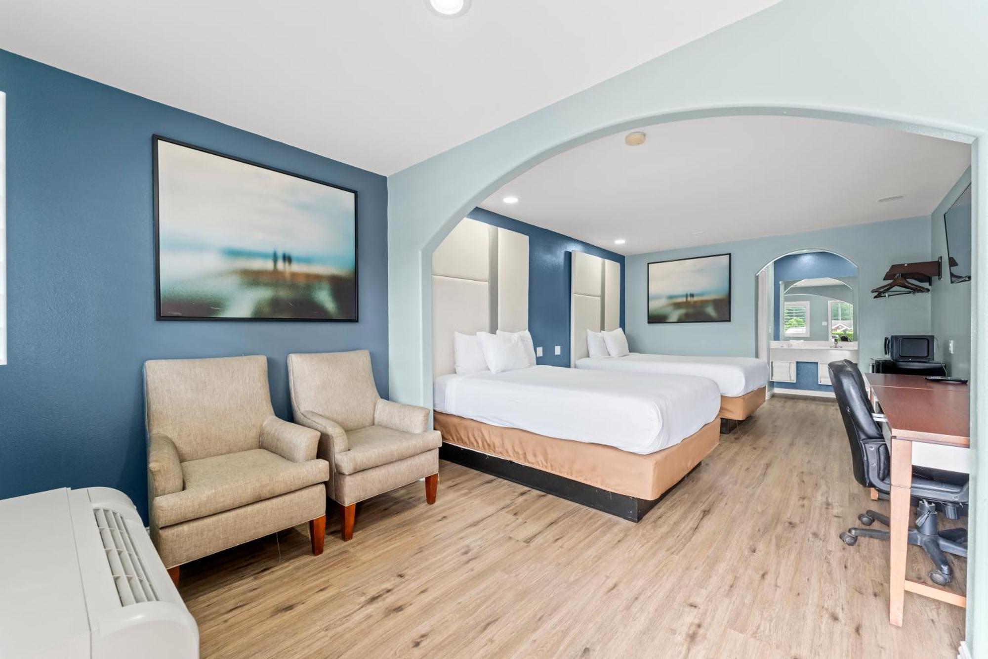 Executive Inn & Suites Magnolia Buitenkant foto
