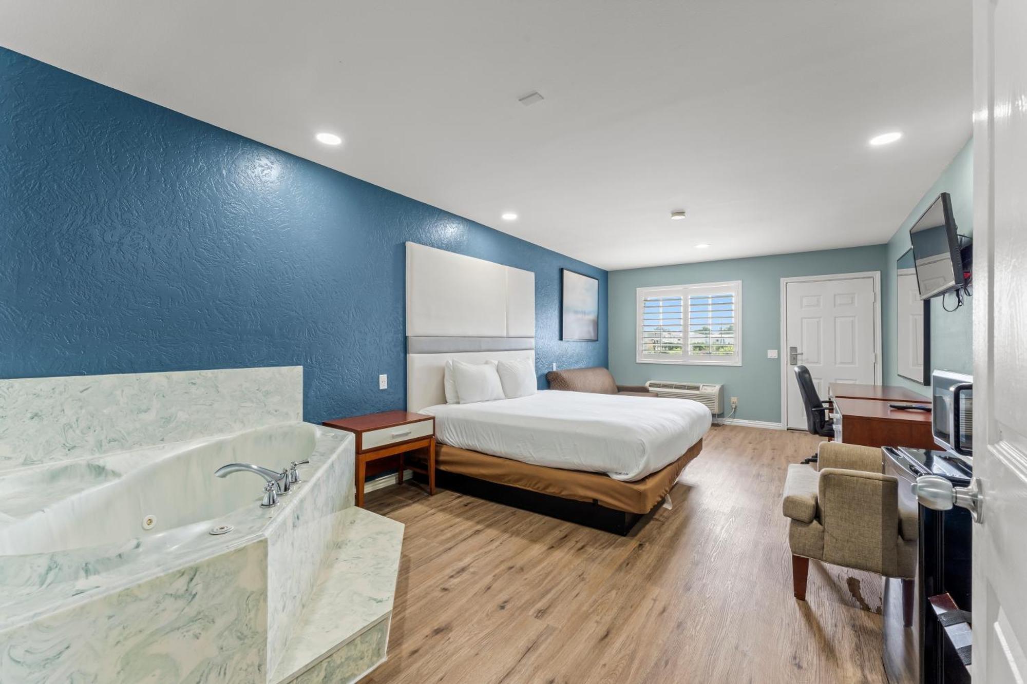 Executive Inn & Suites Magnolia Buitenkant foto