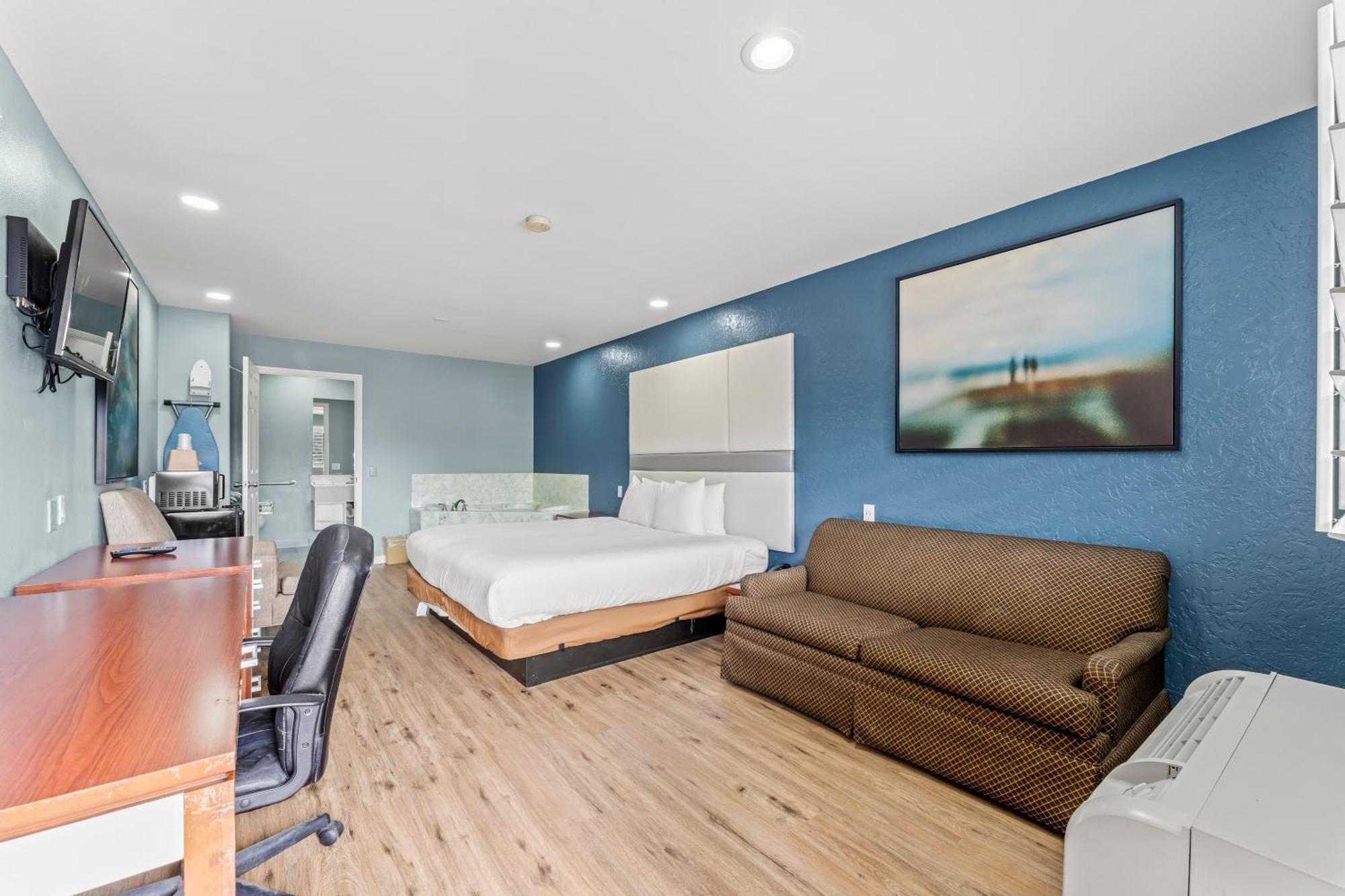 Executive Inn & Suites Magnolia Buitenkant foto