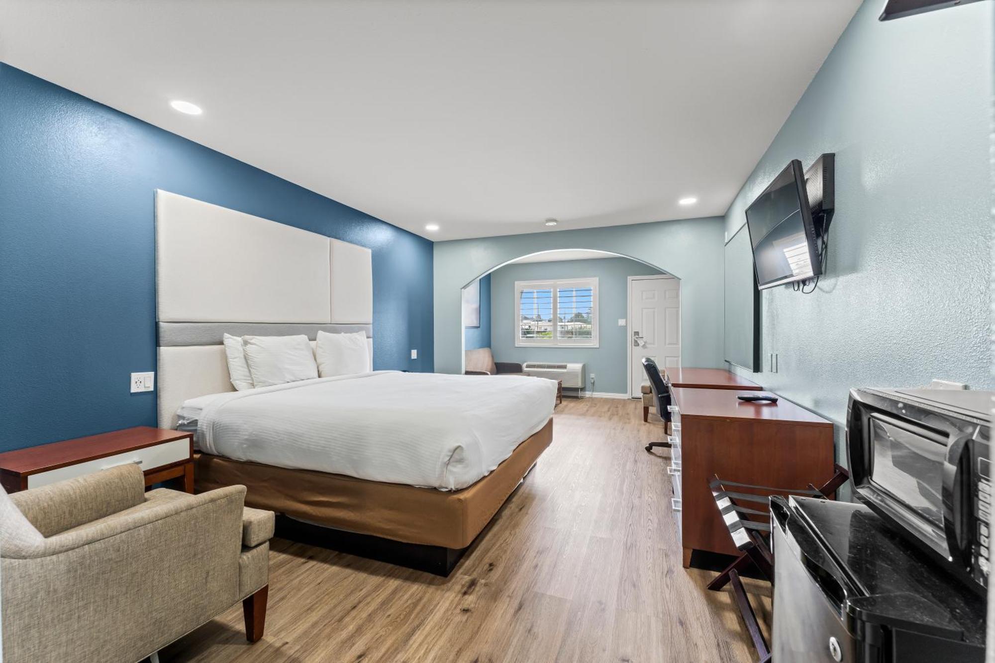 Executive Inn & Suites Magnolia Buitenkant foto