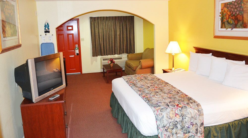 Executive Inn & Suites Magnolia Buitenkant foto
