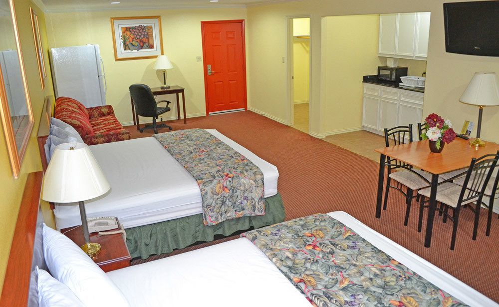 Executive Inn & Suites Magnolia Buitenkant foto