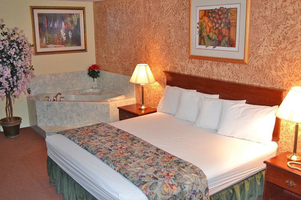 Executive Inn & Suites Magnolia Buitenkant foto