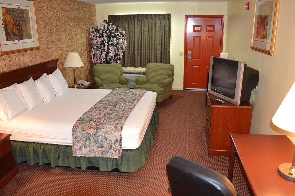 Executive Inn & Suites Magnolia Buitenkant foto